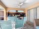 Outdoor patio with built-in grill and seating at 7148 & 7140 Coventry Ter, Englewood, FL 34224