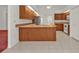 Kitchen with island and stainless steel appliances at 87 Torrington St, Port Charlotte, FL 33954