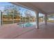 Peaceful screened pool and patio setting at 87 Torrington St, Port Charlotte, FL 33954