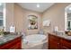 Large bathroom with soaking tub, double vanity at 89 Vivante Blvd # 205, Punta Gorda, FL 33950