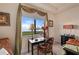 Bedroom with water views and built-in desk at 89 Vivante Blvd # 205, Punta Gorda, FL 33950