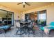 Covered lanai features a table and chairs, plus lounge seating at 89 Vivante Blvd # 205, Punta Gorda, FL 33950