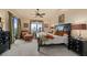 Spacious main bedroom with water views and sitting area at 89 Vivante Blvd # 205, Punta Gorda, FL 33950