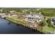 Aerial view of waterfront home with pool and dock at 9458 Snapper Cir, Port Charlotte, FL 33981