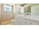 Bathroom with single vanity and large shower at 9458 Snapper Cir, Port Charlotte, FL 33981