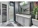 Modern bathroom with glass shower and white cabinets at 9458 Snapper Cir, Port Charlotte, FL 33981