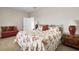 Spacious bedroom with king-size bed and sitting area at 9458 Snapper Cir, Port Charlotte, FL 33981