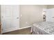 Cozy bedroom with a double bed and access to another room at 9458 Snapper Cir, Port Charlotte, FL 33981