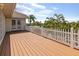 Spacious deck with white railing overlooking a tranquil waterfront view at 9458 Snapper Cir, Port Charlotte, FL 33981