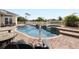 Inviting pool and spa area with comfortable lounge chairs at 9458 Snapper Cir, Port Charlotte, FL 33981