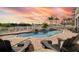 Relaxing pool area with lounge chairs and stunning sunset views at 9458 Snapper Cir, Port Charlotte, FL 33981