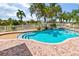 Freeform swimming pool with surrounding patio at 9458 Snapper Cir, Port Charlotte, FL 33981