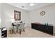 This bedroom is a functional and nicely appointed workspace with a modern black desk and ceiling fan at 10501 Amberjack Way # 101, Englewood, FL 34224