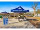 Outdoor view of a boat club featuring a shaded seating area with boat docks at 10501 Amberjack Way # 101, Englewood, FL 34224