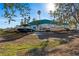 Outdoor boat storage with various boats on trailers, ideal for marine enthusiasts and convenient storage at 10501 Amberjack Way # 101, Englewood, FL 34224