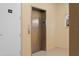 An elevator provides convenient access to different floors in the building, right next to the trash room at 10501 Amberjack Way # 101, Englewood, FL 34224