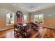 Community game room with wood floors, game tables and vintage ship decor at 10501 Amberjack Way # 101, Englewood, FL 34224