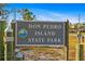Don Pedro Island State Park sign, highlighting natural beauty and park service protection at 10501 Amberjack Way # 101, Englewood, FL 34224