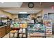A well-stocked restaurant counter with various foods on display, including sandwiches and snacks at 10501 Amberjack Way # 101, Englewood, FL 34224