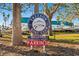 Freedom Boat Club sign advertising membership, guests, and parking at 10501 Amberjack Way # 101, Englewood, FL 34224