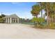 Community tennis courts with on-site changing rooms and bathrooms at 10501 Amberjack Way # 101, Englewood, FL 34224