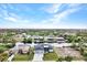 Aerial view of waterfront home with a two-car garage at 15133 Amsterdam, Port Charlotte, FL 33981