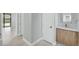 Clean bathroom with modern vanity and light wood cabinets at 15133 Amsterdam, Port Charlotte, FL 33981