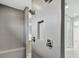 Modern bathroom with double shower heads and gray tile at 15133 Amsterdam, Port Charlotte, FL 33981