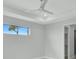 Bright bedroom featuring a ceiling fan and window at 15133 Amsterdam, Port Charlotte, FL 33981