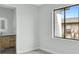 Simple bedroom with a window and adjacent bathroom at 15133 Amsterdam, Port Charlotte, FL 33981