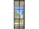 Contemporary home exterior showcasing a large window at 15133 Amsterdam, Port Charlotte, FL 33981