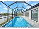 Enclosed pool and spa with canal views at 15133 Amsterdam, Port Charlotte, FL 33981