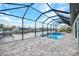 Enclosed pool and spa with canal views at 15133 Amsterdam, Port Charlotte, FL 33981