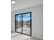 Sliding glass doors open to a relaxing water view from this room at 15133 Amsterdam, Port Charlotte, FL 33981