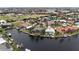 Aerial view of a luxurious waterfront community in a tropical setting at 1637 Bobolink Ct, Punta Gorda, FL 33950