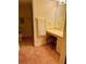 Bathroom vanity with a large mirror and a stool at 175 Kings Hwy # Bldg 3 314, Punta Gorda, FL 33983