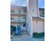 Condo building exterior showcasing the entrance to unit 315 at 175 Kings Hwy # Bldg 3 314, Punta Gorda, FL 33983