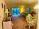 Bright living room with sliding glass doors leading to a patio at 175 Kings Hwy # Bldg 3 314, Punta Gorda, FL 33983