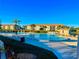 Community pool with lounge chairs and patio area at 175 Kings Hwy # Bldg 3 314, Punta Gorda, FL 33983