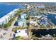 Aerial showcasing community amenities and waterfront location at 1801 Jamaica Way # 112, Punta Gorda, FL 33950