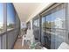 Relaxing screened balcony with seating area, perfect for enjoying the outdoors at 1801 Jamaica Way # 112, Punta Gorda, FL 33950