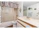 Clean bathroom with single vanity and shower/tub combo at 1801 Jamaica Way # 112, Punta Gorda, FL 33950
