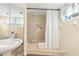Bathroom boasts a shower/tub combo, updated vanity, and a linen closet at 1801 Jamaica Way # 112, Punta Gorda, FL 33950