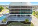 Exterior view of building highlighting the subject unit's balcony at 1801 Jamaica Way # 112, Punta Gorda, FL 33950