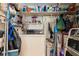 Small laundry room with washer, dryer, and storage at 1801 Jamaica Way # 112, Punta Gorda, FL 33950