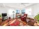 Bright living room with hardwood floors, comfortable seating, and a beautiful rug at 1801 Jamaica Way # 112, Punta Gorda, FL 33950