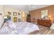 Spacious main bedroom with king-size bed and private balcony access at 1801 Jamaica Way # 112, Punta Gorda, FL 33950