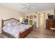 Large main bedroom with a king-size bed and plenty of closet space at 1801 Jamaica Way # 112, Punta Gorda, FL 33950