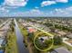 Aerial view showcasing the home's location in a residential neighborhood at 188 Broadmoor Ln, Rotonda West, FL 33947