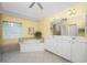 Large bathroom with a corner soaking tub and double vanity at 188 Broadmoor Ln, Rotonda West, FL 33947